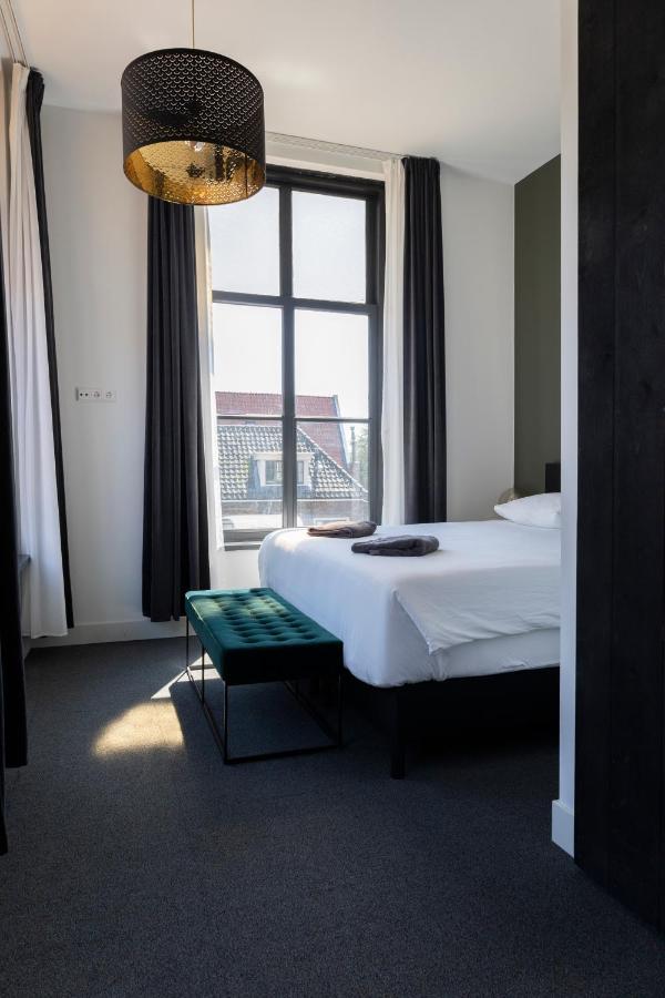 Hotel En Stadscafe De Dam L Hotel مونِكِندام المظهر الخارجي الصورة
