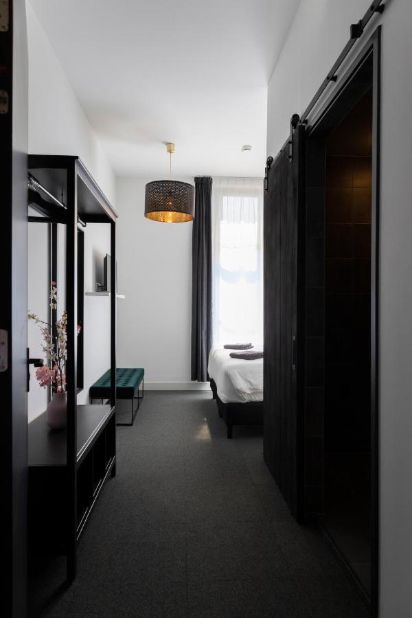 Hotel En Stadscafe De Dam L Hotel مونِكِندام المظهر الخارجي الصورة