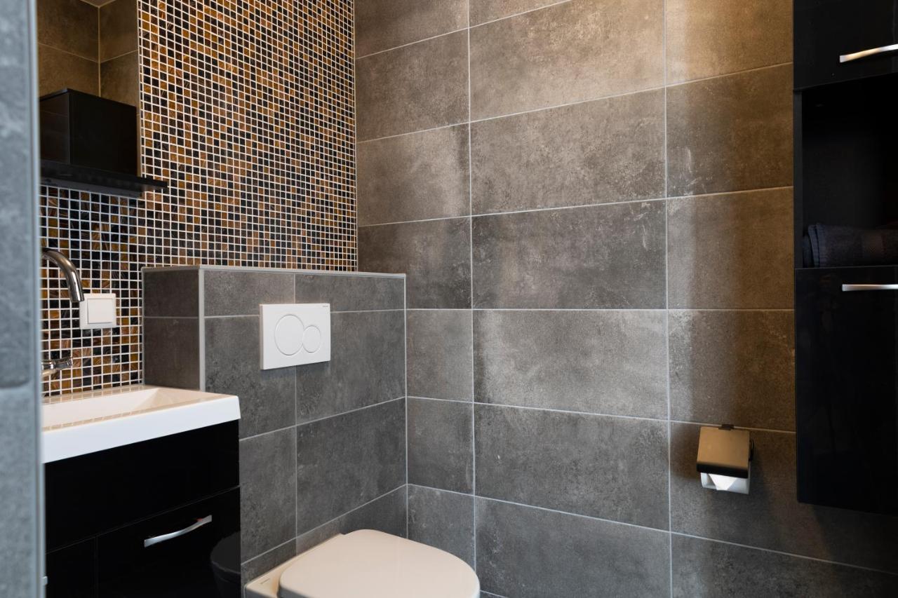 Hotel En Stadscafe De Dam L Hotel مونِكِندام المظهر الخارجي الصورة