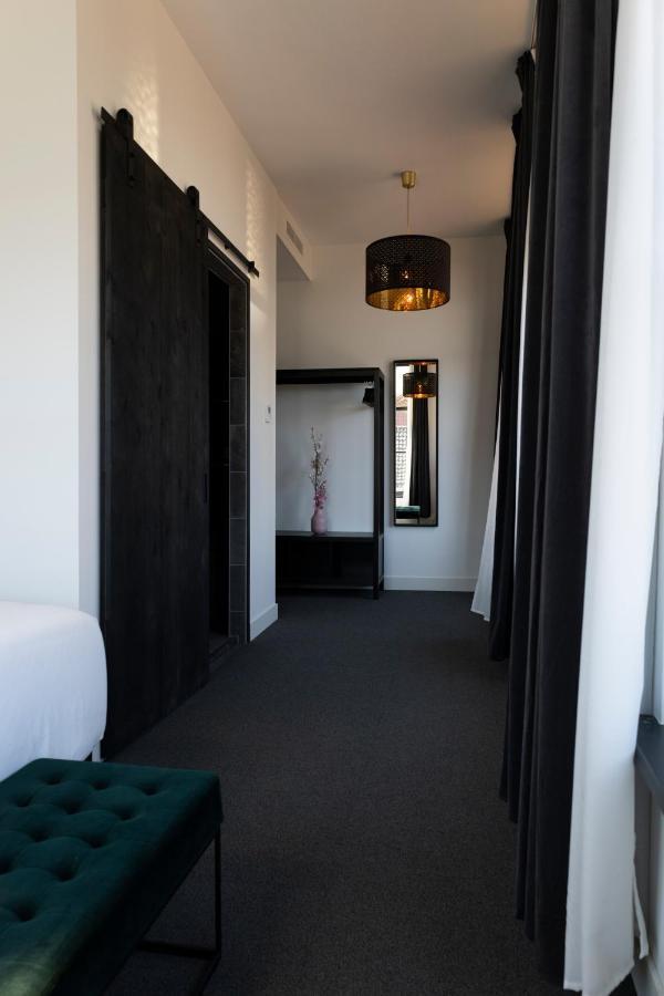 Hotel En Stadscafe De Dam L Hotel مونِكِندام المظهر الخارجي الصورة