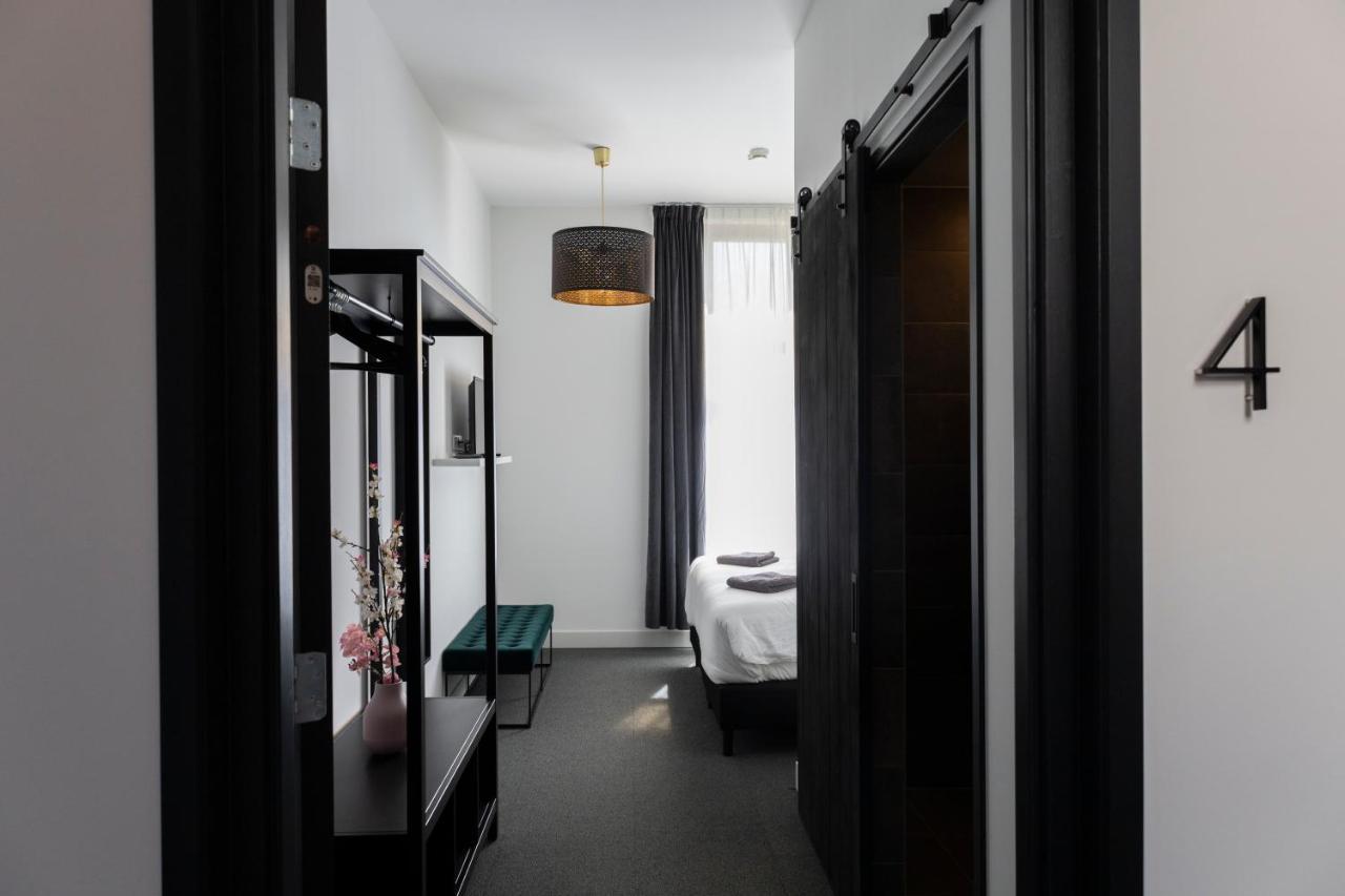 Hotel En Stadscafe De Dam L Hotel مونِكِندام المظهر الخارجي الصورة