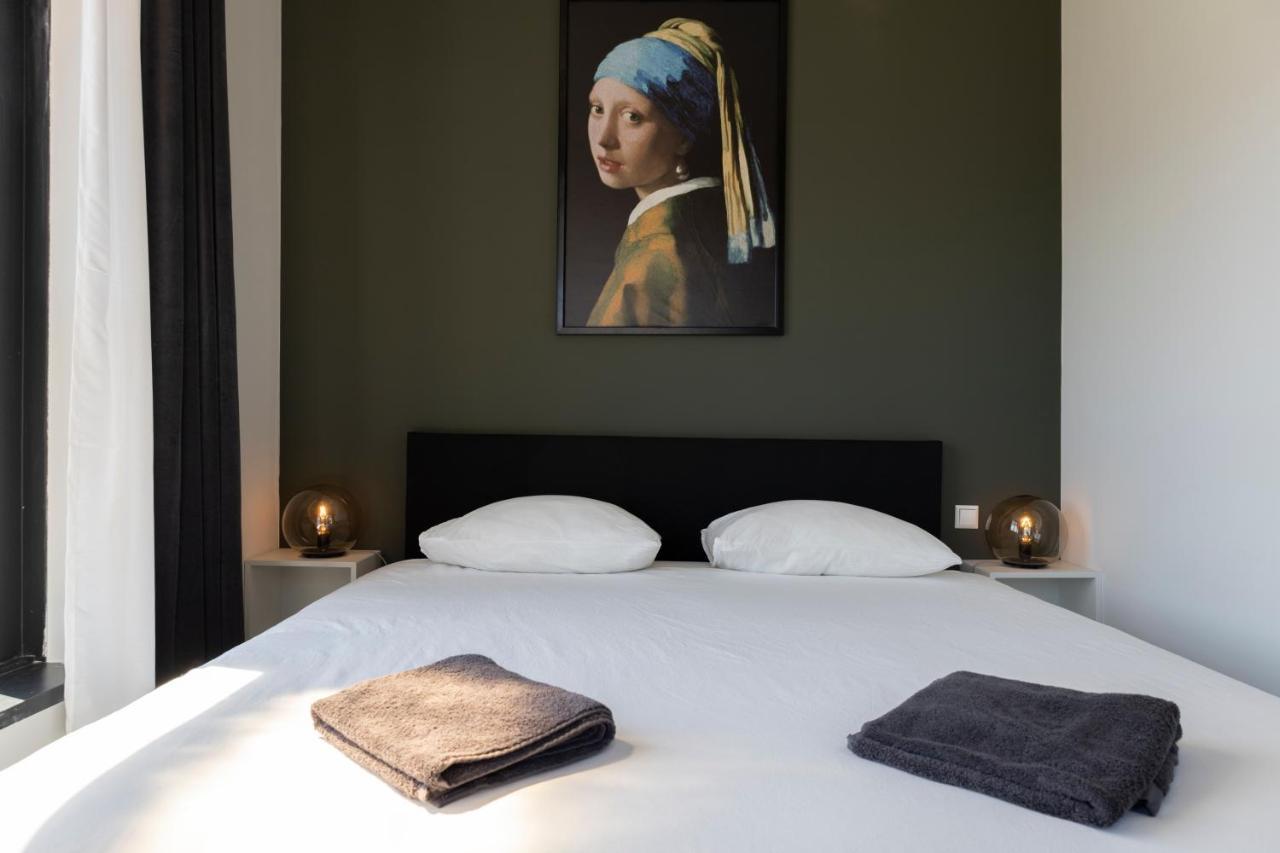 Hotel En Stadscafe De Dam L Hotel مونِكِندام المظهر الخارجي الصورة